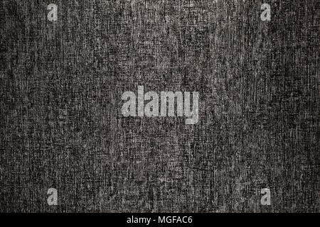 Grizzled and textured dark gray wallpaper background Stock Photo