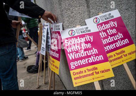 London, UK. 28th Apr, 2018. Banners slogans seen ready to taken for the protesters.The Windrush generation solidarity protest gathered around 200 people at the Churchill Statue in Parliament Square to show disgust at the government's treatment of those from the Windrush generation. ''Despite the government's recent actions to attempt to rectify it, this never should have happened in the first place'', they say. Credit: Brais G. Rouco/SOPA Images/ZUMA Wire/Alamy Live News Stock Photo
