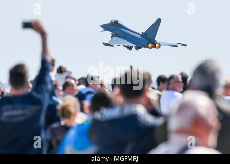 28 April 2018, Germany, Schoenefeld: A Eurofighter Typhoon of the Bundeswehr (German Federal Armed Forces) taking off during the air show of the ILA 2018. About 200 aircraft are being presented during the ILA 2018 international aeronautic exhibition. The organisers expect about 150,000 visitors. Photo: Patrick Pleul/dpa-Zentralbild/dpa Stock Photo