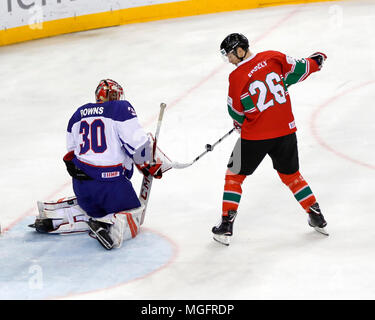 Budapest, Hungary. 28 April 2018.  (l-r) Goalie Ben Bowns of Great Britain and Csanad Erdely of Hungary in action during the 2018 IIHF Ice Hockey World Championship Division I Group A match between Hungary and Great Britain at Laszlo Papp Budapest Sports Arena on April 28, 2018 in Budapest, Hungary. Credit: Laszlo Szirtesi/Alamy Live News Stock Photo