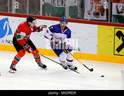 Budapest, Hungary. 28 April 2018. (l-r) Bence Stipsicz of Hungary challenges Robert Lachowicz of Great Britain during the 2018 IIHF Ice Hockey World Championship Division I Group A match between Hungary and Great Britain at Laszlo Papp Budapest Sports Arena on April 28, 2018 in Budapest, Hungary. Credit: Laszlo Szirtesi/Alamy Live News Stock Photo
