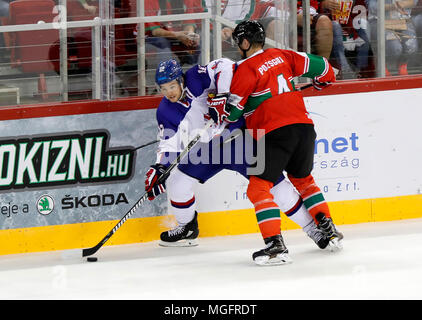 Budapest, Hungary. 28 April 2018. (r-l) Tamas Pozsgai of Hungary challenges Robert Dowd of Great Britain during the 2018 IIHF Ice Hockey World Championship Division I Group A match between Hungary and Great Britain at Laszlo Papp Budapest Sports Arena on April 28, 2018 in Budapest, Hungary. Credit: Laszlo Szirtesi/Alamy Live News Stock Photo