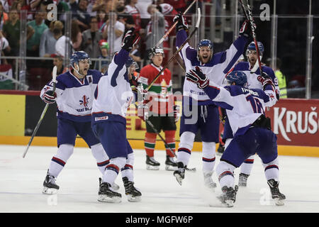 Budapest, Hungary. 28th Apr, 2018. Players of Britain celebrate during the Division I Group A match between Britain and Hungary at the 2018 IIHF Ice Hockey World Championship in Budapest, Hungary, on April 28, 2018. Britain won 3-2. Credit: Csaba Domotor/Xinhua/Alamy Live News Stock Photo