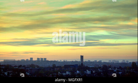 Glasgow, Scotland, UK 29th April. UK Weather :Early morning sunshine colours the sky with the promise of a sunny day and the dawn over the towers of Maryhill and the highest listed building the tower Anniesland Court in the west of the city. Gerard Ferry/Alamy news Credit: gerard ferry/Alamy Live News Stock Photo