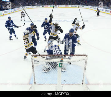 Tampa, Florida, USA. 28th Apr, 2018. DIRK SHADD | Times.Boston Bruins players throw their sticks in the air while celebrating a first period, power play goal against the Tampa Bay Lightning during Game 1 of the Eastern Conference semifinal game of the Stanley Cup Playoffs between the Tampa Bay Lightning and the Boston Bruins Saturday, April 28, 2018 in Tampa. Boston Bruins left wing Rick Nash (61) was credited with the goal. Credit: Dirk Shadd/Tampa Bay Times/ZUMA Wire/Alamy Live News Stock Photo