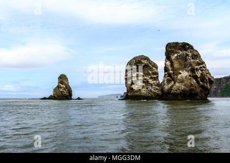 Seascape of Kamchatka Peninsula, view on Three Brothers Rocks in Avacha Bay (Avachinskaya Bay), Pacific Ocean, Russia. Stock Photo