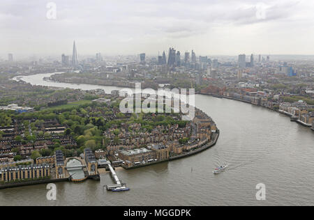 High level view of the River Thames from Canary Wharf, view west towards the City of London. Overcast April morning. Shows Rotherhithe in foreground. Stock Photo