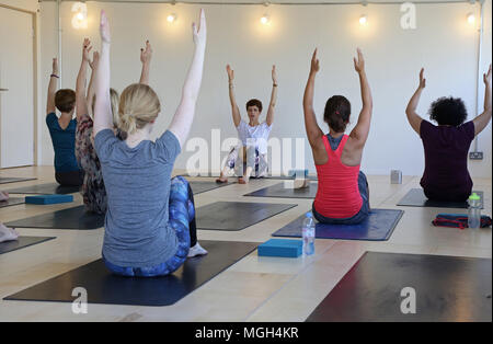 A pilates class in progress at the Peckham Levels, the newly converted multi-storey car park in this now-trendy part of South East London, UK Stock Photo