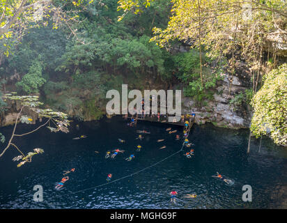 Yokdzonot, Chichen Itza, Mexico, South America: [Yokdzonot cenote, natural pit sinkhole, swimming and relaxing tourist attraction in Mexico Stock Photo