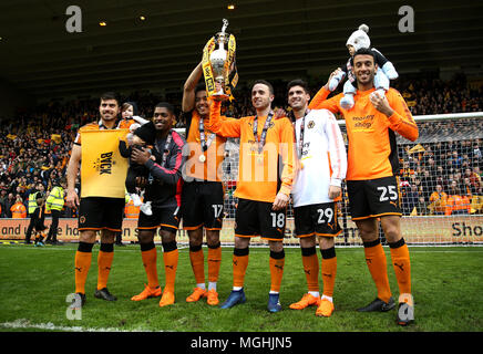 Wolverhampton Wanderers' Ruben Neves (left), Ivan Cavaleiro (second left), Helder Costa (centre left), Diogo Jota (centre right), Ruben Vinagre (second right) and Roderick Miranda (right) celebrate with the trophy after the Sky Bet Championship match at Molineux, Wolverhampton. Stock Photo