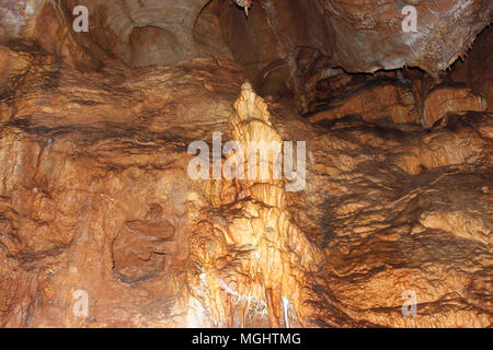 Beutiful cave of stalactites and stalagmites. Nature creates magnificent sculptures and shapes. Stock Photo