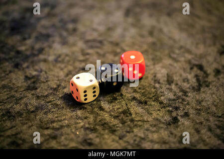 three dices on a table Stock Photo