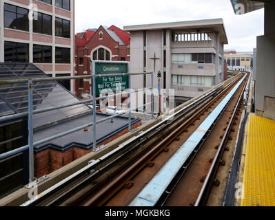 Detroit, Michigan/USA - April 7th, 2018 : Station Greektown of the Detroit People Mover beside a church. Stock Photo