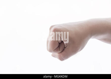 hand squeezed in fist in stone, for background and business Stock Photo