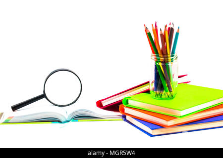 Books ,pen,pencil and office equipment on pink background, education and  back to school concept,Clipping path Stock Photo