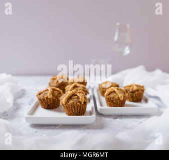 Hot Cross Muffins for Easter, brightly lit table scene Stock Photo
