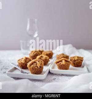 Hot Cross Muffins for Easter, brightly lit table scene Stock Photo