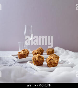 Hot Cross Muffins for Easter, brightly lit table scene Stock Photo
