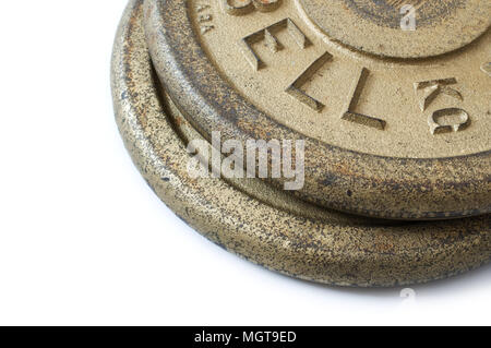 Detail of barbell weights on white background. Stock Photo