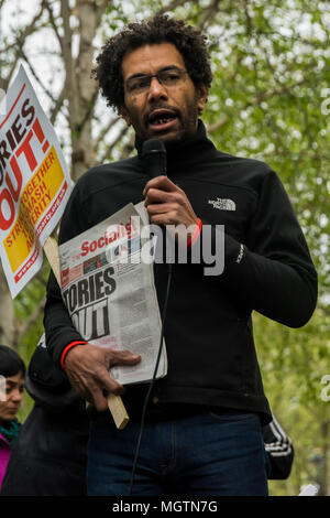 London, UK. 28 April 2018. Unison NEC and Socialist Party member Hugo Pierre speaks outside the Home Office in a protest by people disgusted by the government's incompetence and deliberately targeted attacks on legal immigrants. Protest organiser Sara Burke wrote on Facebook that ''the government's abhorrent treatment of those from the Windrush generation is a national embarrassment'' and planned the march to the Home office to put pressure on them to keep their promises to these people. Credit: ZUMA Press, Inc./Alamy Live News Stock Photo