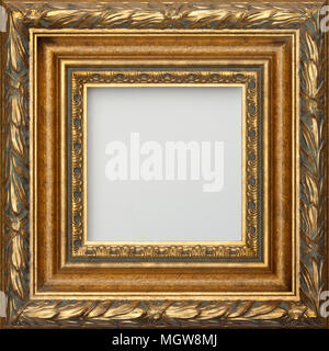 Ornate square gold picture frame. Stock Photo
