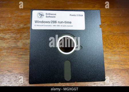 A 5¼-inchfloppy disk sitting on a table. Stock Photo