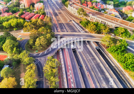 Multi-lane intersection on Warringah freeway in North Sydney approaching Sydney Harbour bridge - aerial top down view between local residential suburb Stock Photo