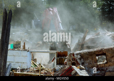 Demolish building with debris in city, broken house on ruin demolishing Stock Photo
