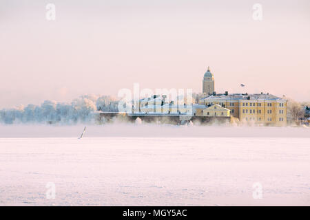 Suomenlinna from across frozen,misty sea,Helsinki,Finland,Europe Stock Photo