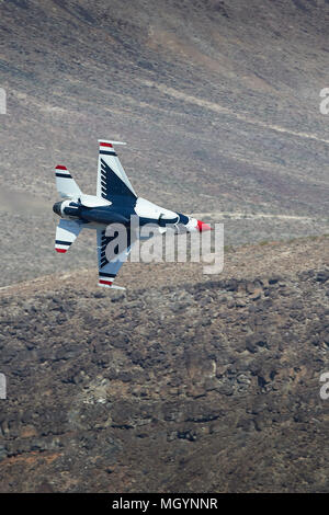 Twin Seat United States Air Force Lockheed Martin F-16D Fighting Falcon From The USAF 'Thunderbirds' Flying Through Rainbow Canyon, California. Stock Photo