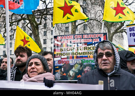 Kurdish men and  women protesting genocide in Afrin in Syria on Stand up against Racism, International demonstration in London to mark UN anti-racism day. March 17 2018 Stock Photo