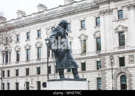 Famous,bronze,statue,of,Churchill,opposite,Houses of Parliament,on,Parliament Square,London,England,GB,Great Britain,UK.,U.K.,Europe,European, Stock Photo