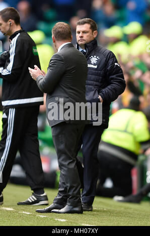 Celtic manager Brendan Rodgers shakes hands with the match officials ...