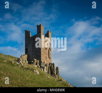 Lilburn Tower, Dunstanburgh Castle, Northumberland, UK. Stock Photo