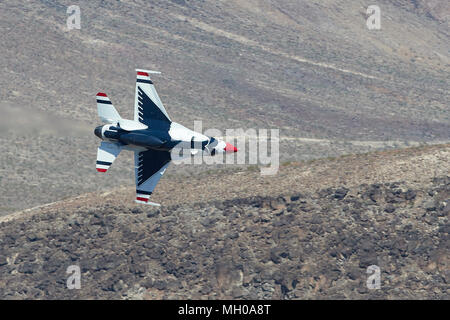 Close Up US Air Force Lockheed Martin F-16D Fighting Falcon From The USAF 'Thunderbirds' Flying At Low Level Through Rainbow Canyon, California, USA. Stock Photo