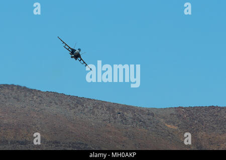 Head On Image Of A United States Navy F/A-18F Super Hornet Jet Fighter Flying At Low Level Through Rainbow Canyon California, USA. Stock Photo