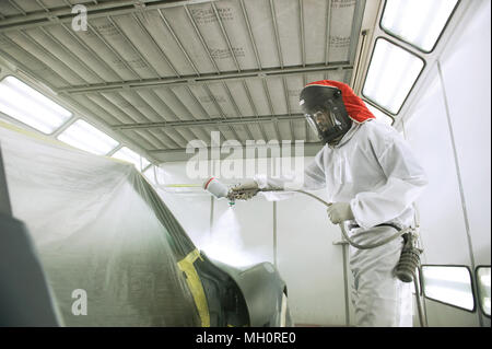 Car being resprayed in workshop. Stock Photo