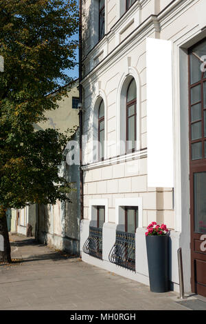 Horizontal front view of blank rectangular signage on a building with classical architecture Stock Photo
