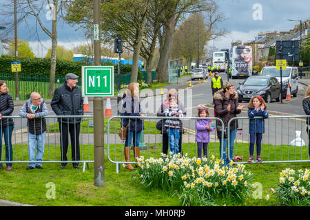 Stirling, Scotland, UK - April 29, 2018: Some onlookers at the first Stirling Marathon awaiting the runners as they approach the final line. The first Stock Photo