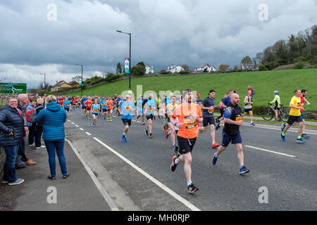 Stirling, Scotland, UK - April 29, 2018: Lead runners and onlookers of the first Srirling marathon and half marathon as they left their starting point Stock Photo