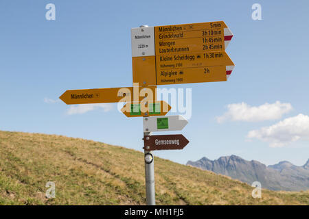Directional sign marking  hiking trails in the Swiss Alps Stock Photo