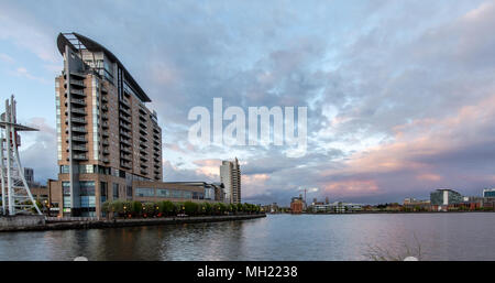 Salford Quays Imperial Point residential building with outlet mall waterfront and the central bay seen from the south side of the Manchester Ship Cana Stock Photo