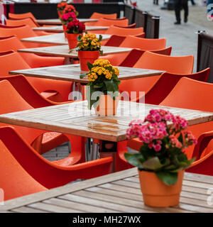 Flowers on tables ourside a cafe in Windsor, UK Stock Photo