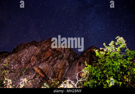 The Stars shine above Ely's Peak near Duluth, Minnesota during a Summer Night Stock Photo