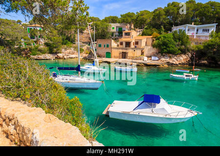 Sailing boats anchoring in beautiful bay in Cala Figuera village, Majorca island, Spain Stock Photo