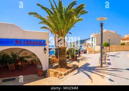 MAJORCA ISLAND, SPAIN - APR 18, 2013: Typical restaurant in small town of Sant Elm on sunny beautiful day. This Spanish island is most visited by tour Stock Photo
