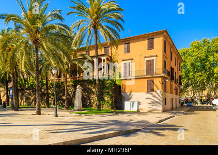 MAJORCA ISLAND, SPAIN - APR 13, 2013: Colorful historic buildings in old town of Palma de Majorca, capital of the island, very popular tourist destina Stock Photo