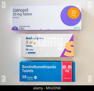 Packs of tablets for treatment of hypertension or high blood pressure. Lisinopril, Amlodipine (Norvasc) and Bendroflumethiazide (Furosemide) Stock Photo