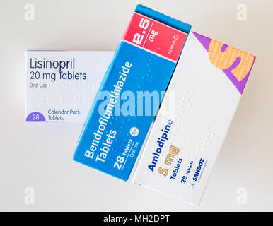 Packs of tablets for treatment of hypertension or high blood pressure. Lisinopril, Amlodipine (Norvasc) and Bendroflumethiazide (Furosemide) Stock Photo