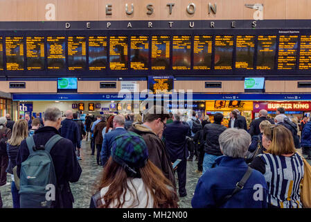 LONDON, UNITED KINGDOM - APRIL 17: This is the departures waiting area in Euston station, a busy railway and underground station in the downtown area  Stock Photo